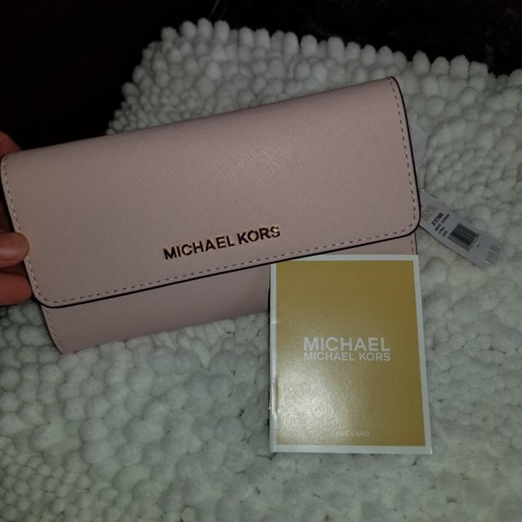 Michael Kors Handbags - Pale pink Michael Kors wallet.